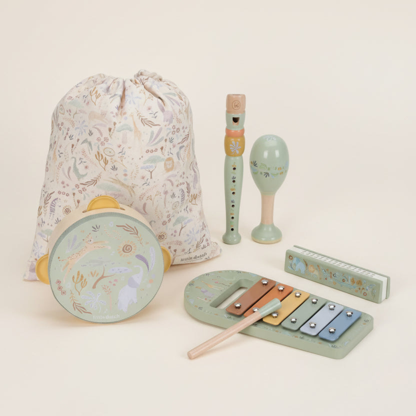 Set of children's musical instruments with a drawstring bag on a white background