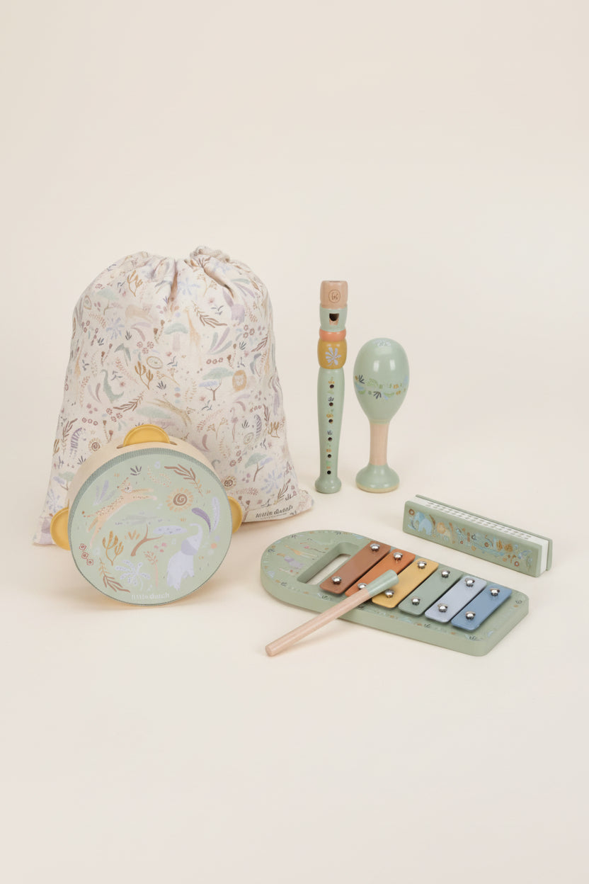 Set of children's musical instruments with a drawstring bag on a white background