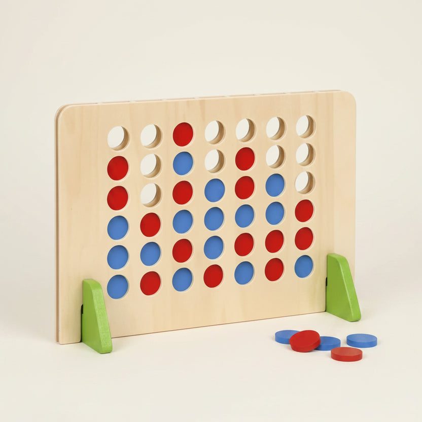 A wooden Connect-four game board with red and blue discs, supported by green triangular stands on a white background.