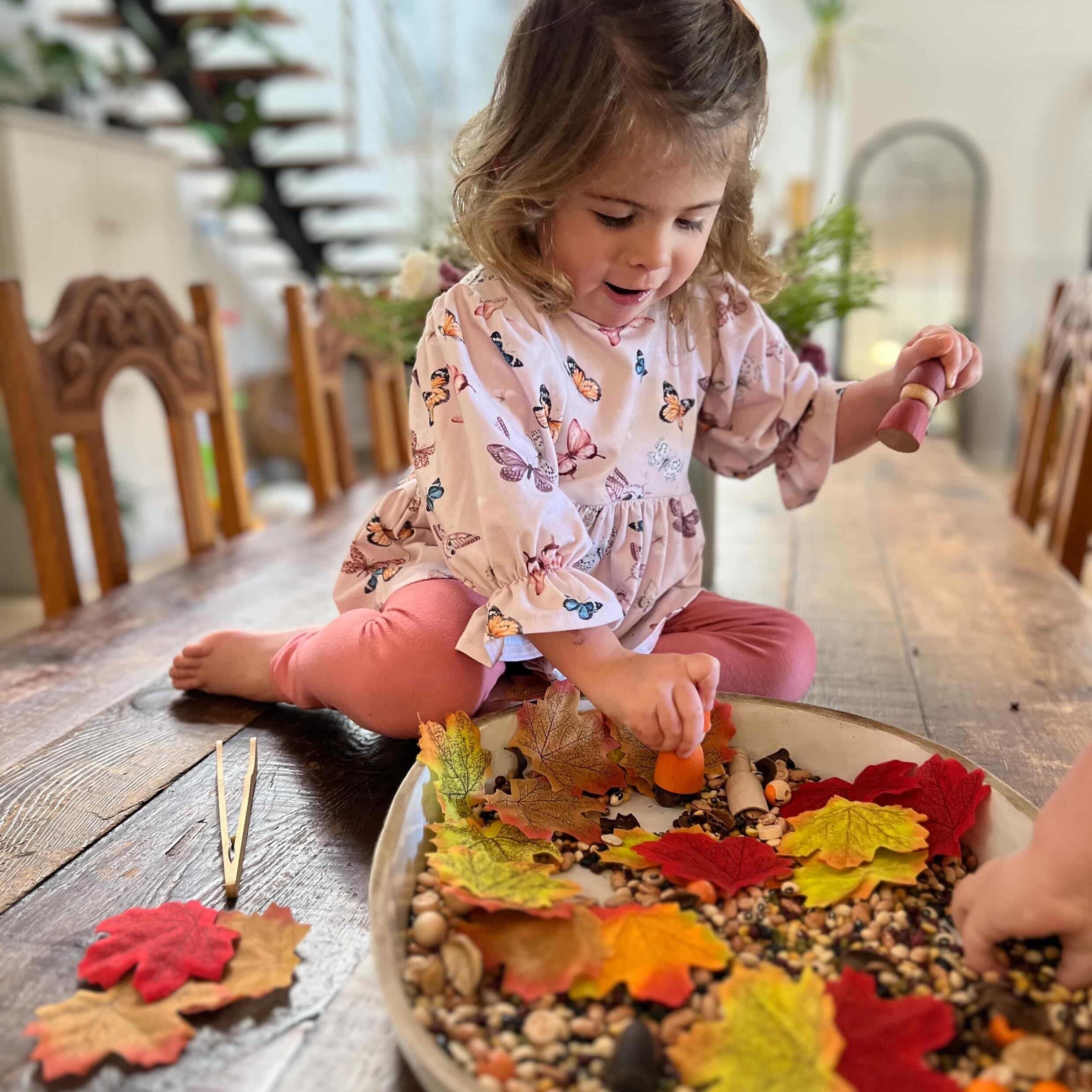 Pour and Play Sensory Set — OT-designed themed sensory play for children 3 years and older. Child Playing with Autumn set.