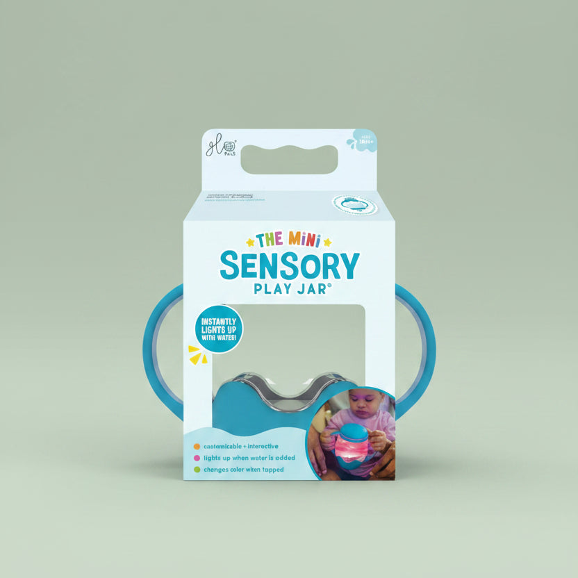 Package of 'The Mini Sensory Play Jar' with blue handles on a white background