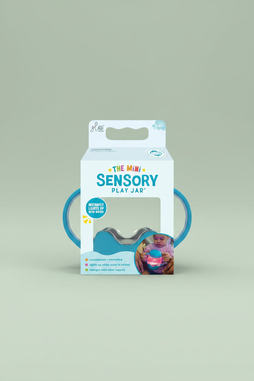 Package of 'The Mini Sensory Play Jar' with blue handles on a white background