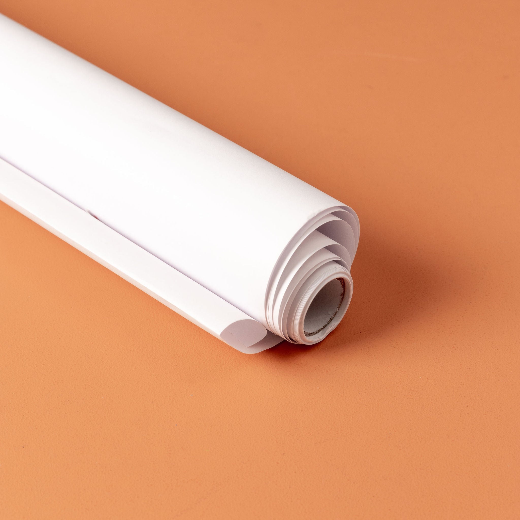 Paper roll for table top paper dispenser