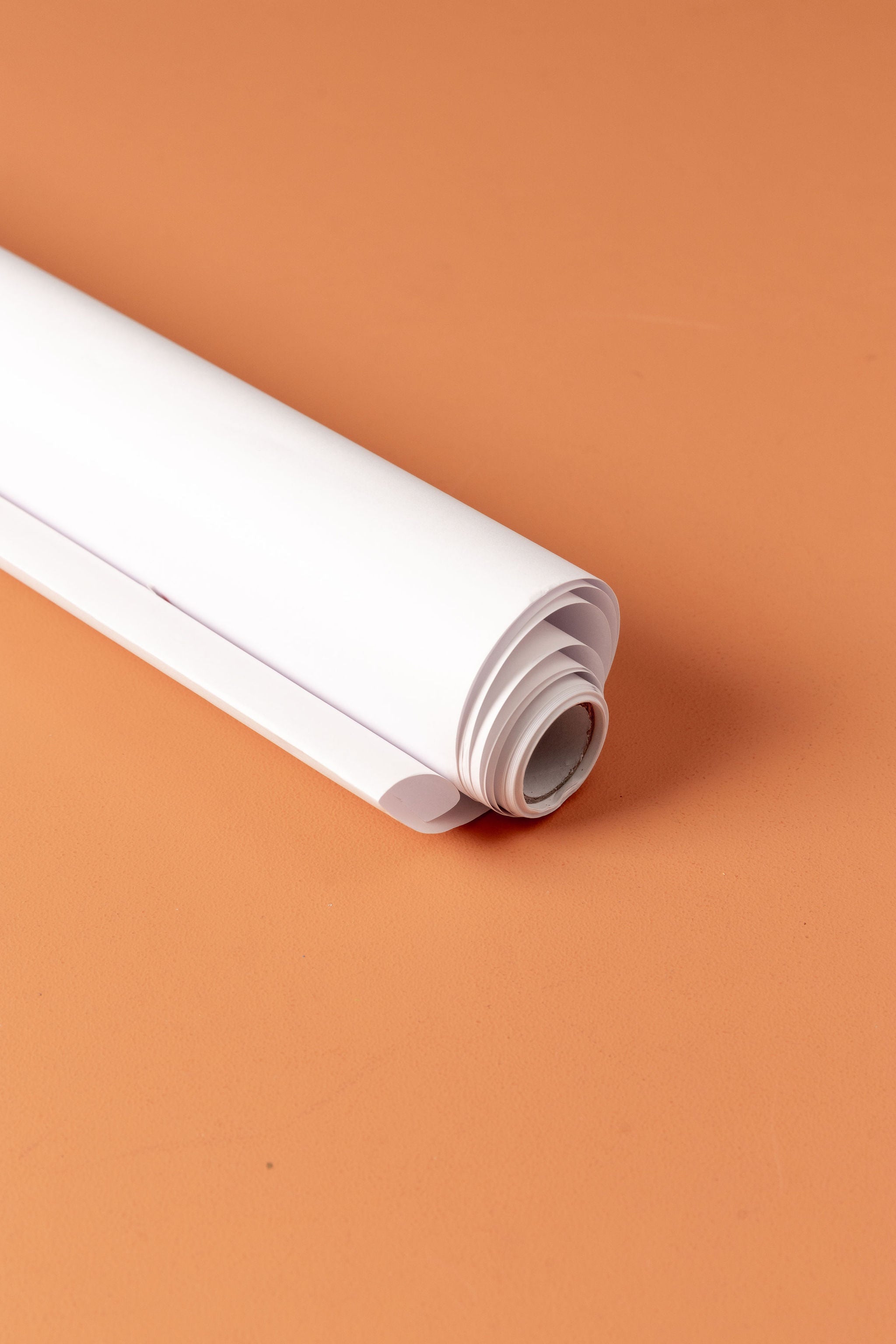 Paper roll for table top paper dispenser