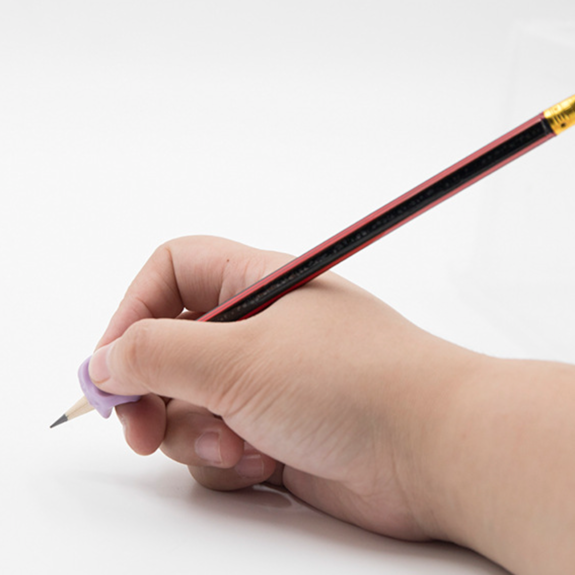 pencil grip for sensory feedback and control