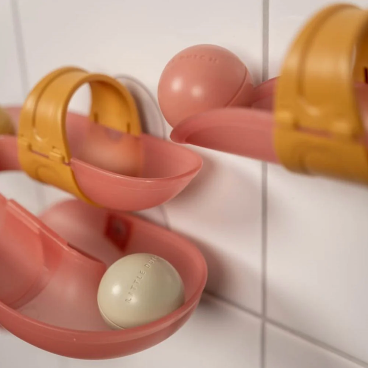 Pink bath ball track for toddlers