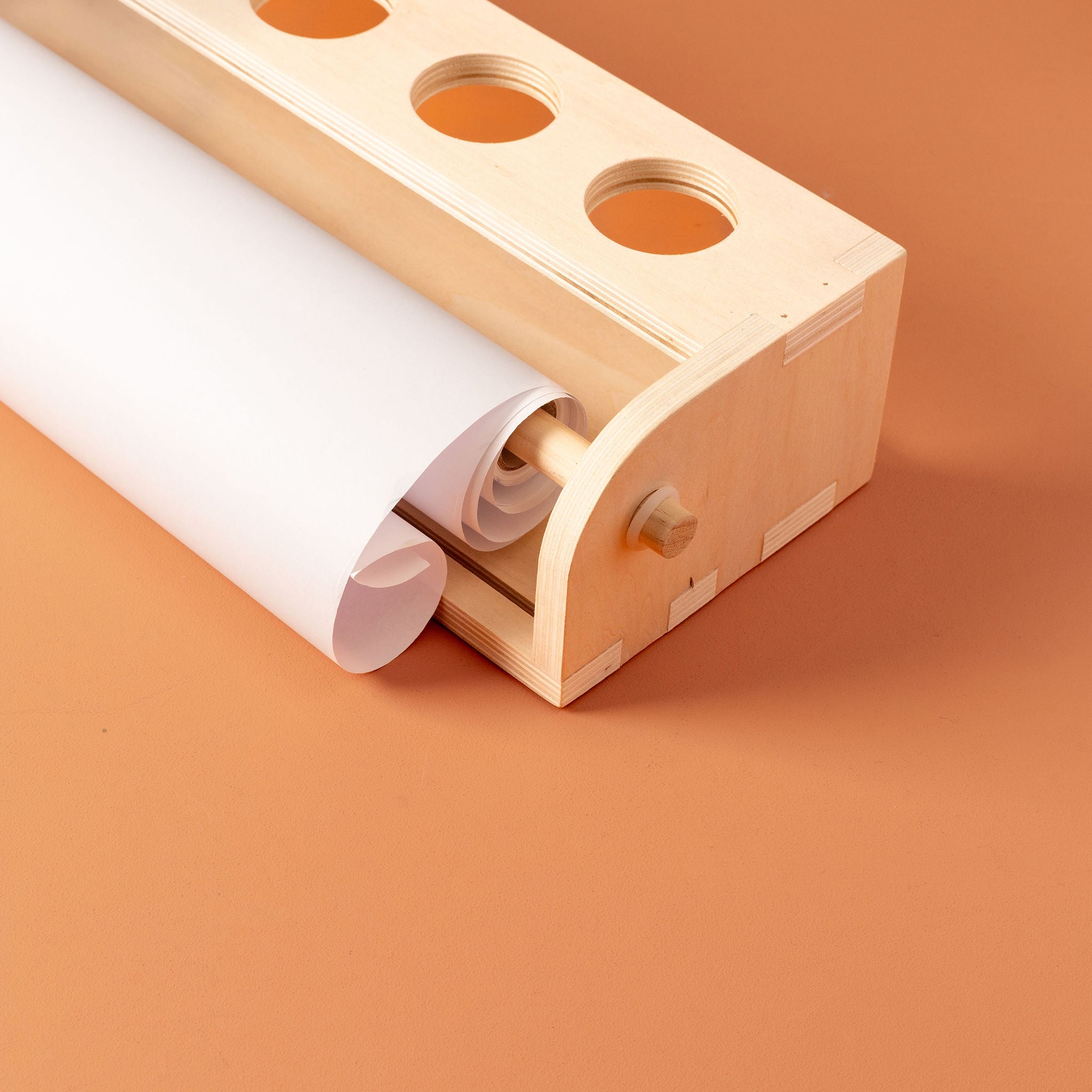 drawing with paper roll dispenser on table