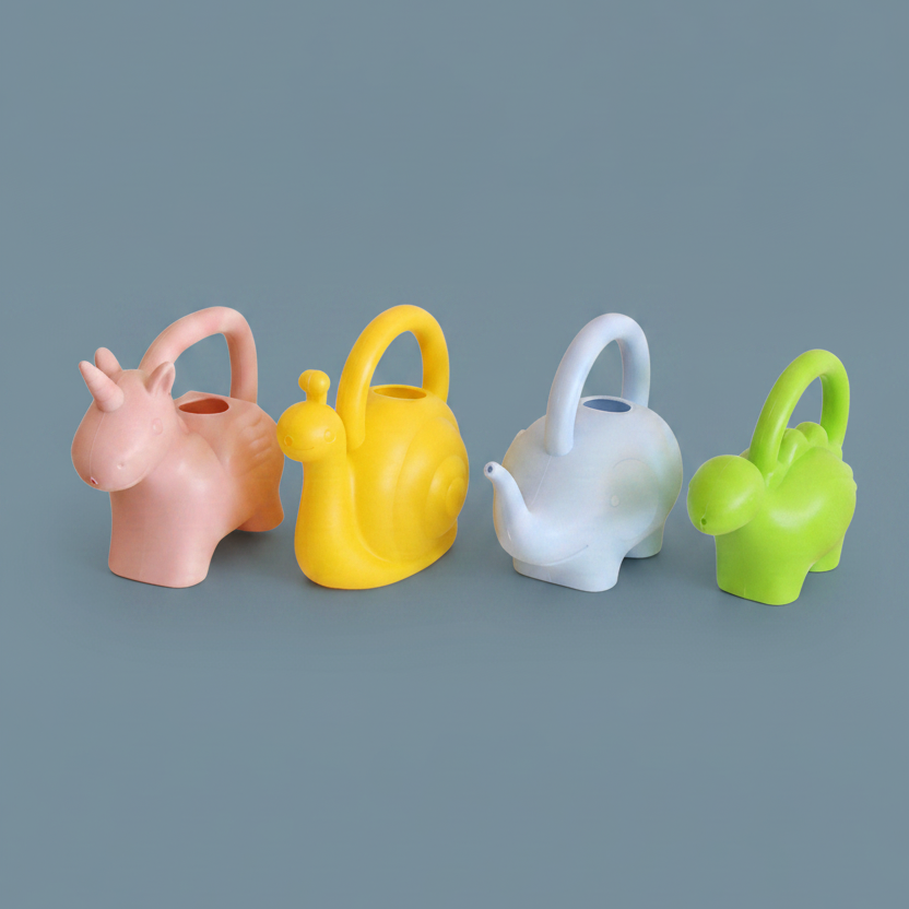 Four animal-shaped watering cans in pink, yellow, light blue, and green, arranged in a row on a plain white background.