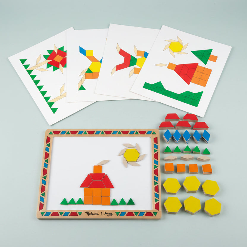 Educational toy set with wooden frame, colorful shapes, and cards on a white background
