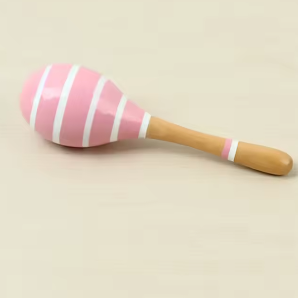 A collection of colorful wooden maracas, each hand-painted with non-toxic, child-safe paints. The maracas come in various colors and patterns, displayed against a white background.