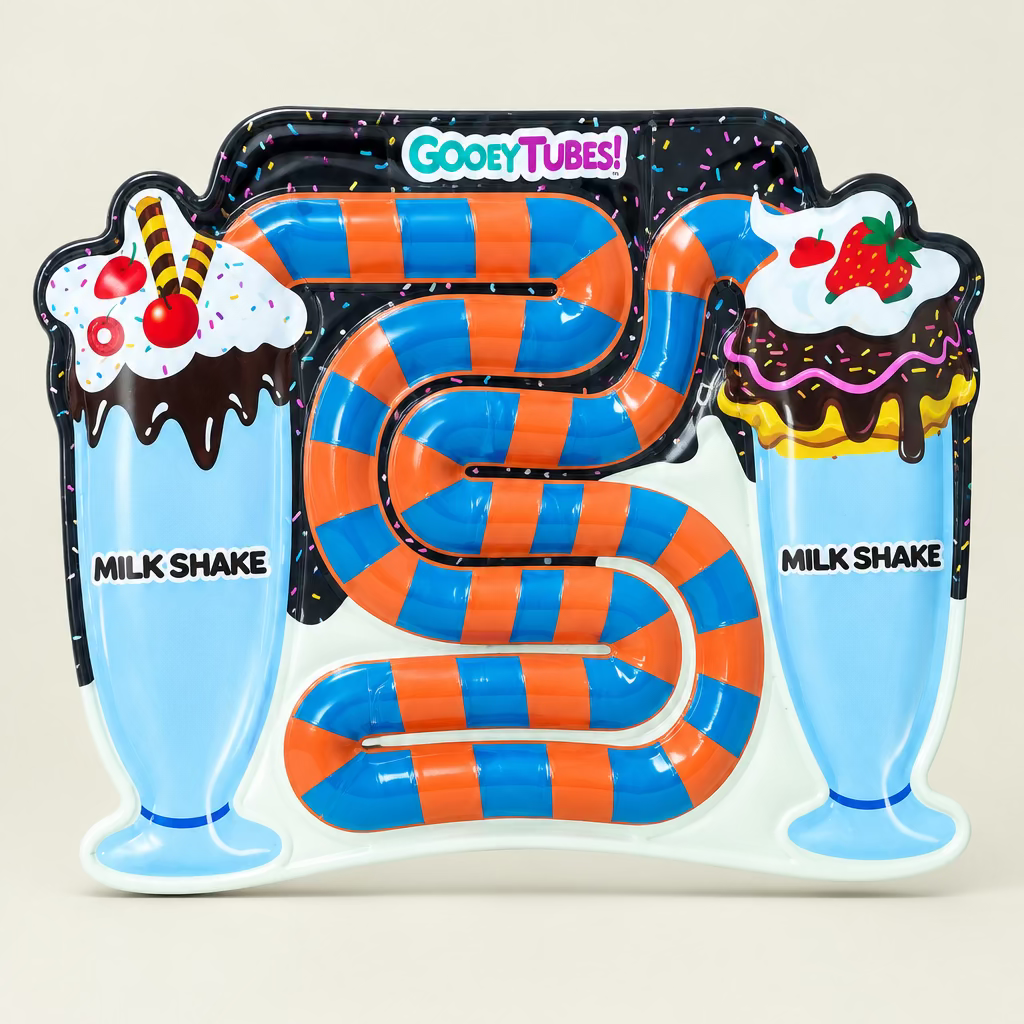 gooey tubes milkshake on beige background