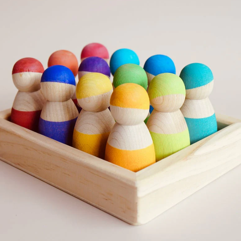 wooden painted peg dolls in wooden tray