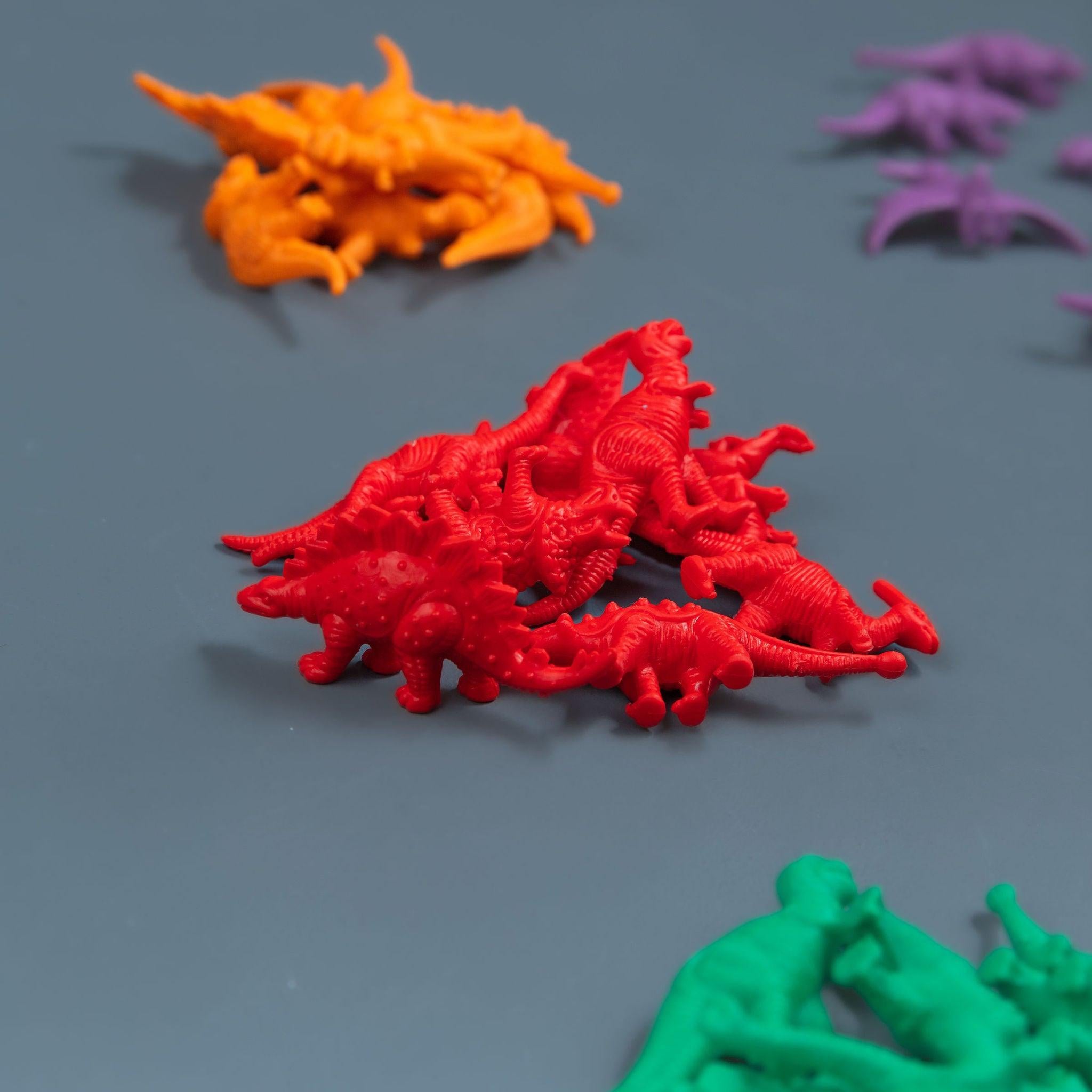 Dinosaur counters set of 48 in multiple colours for counting, sorting and imaginative play