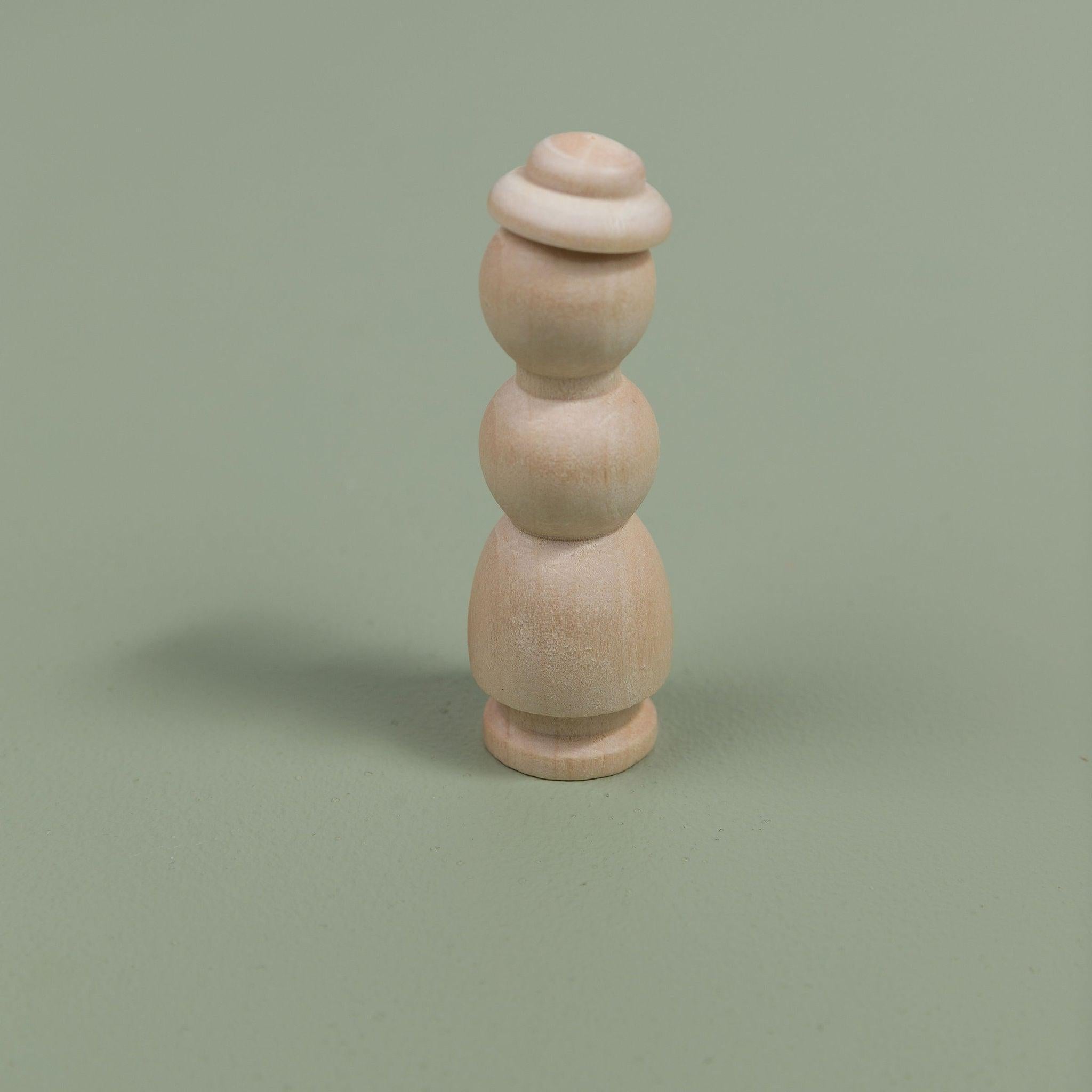 Simple wooden peg figures for imaginative play