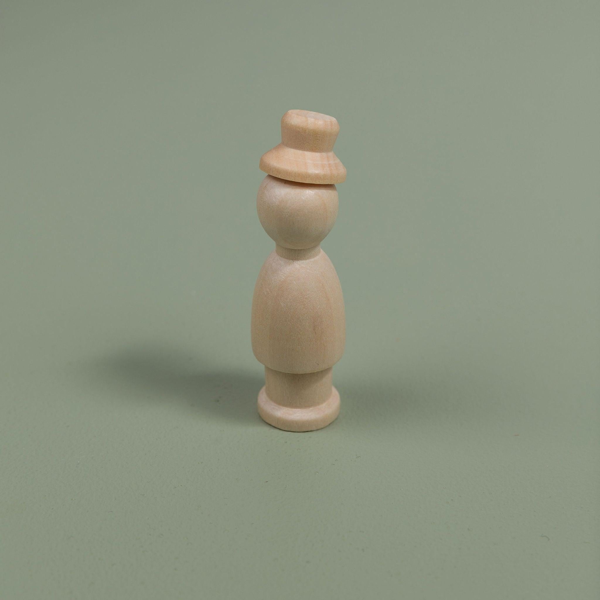 Neutral wooden peg dolls for Waldorf inspired play
