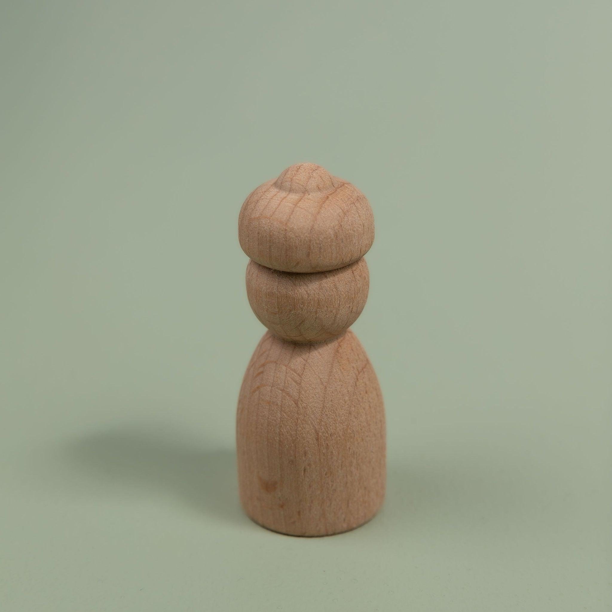 Montessori inspired peg dolls for open ended play
