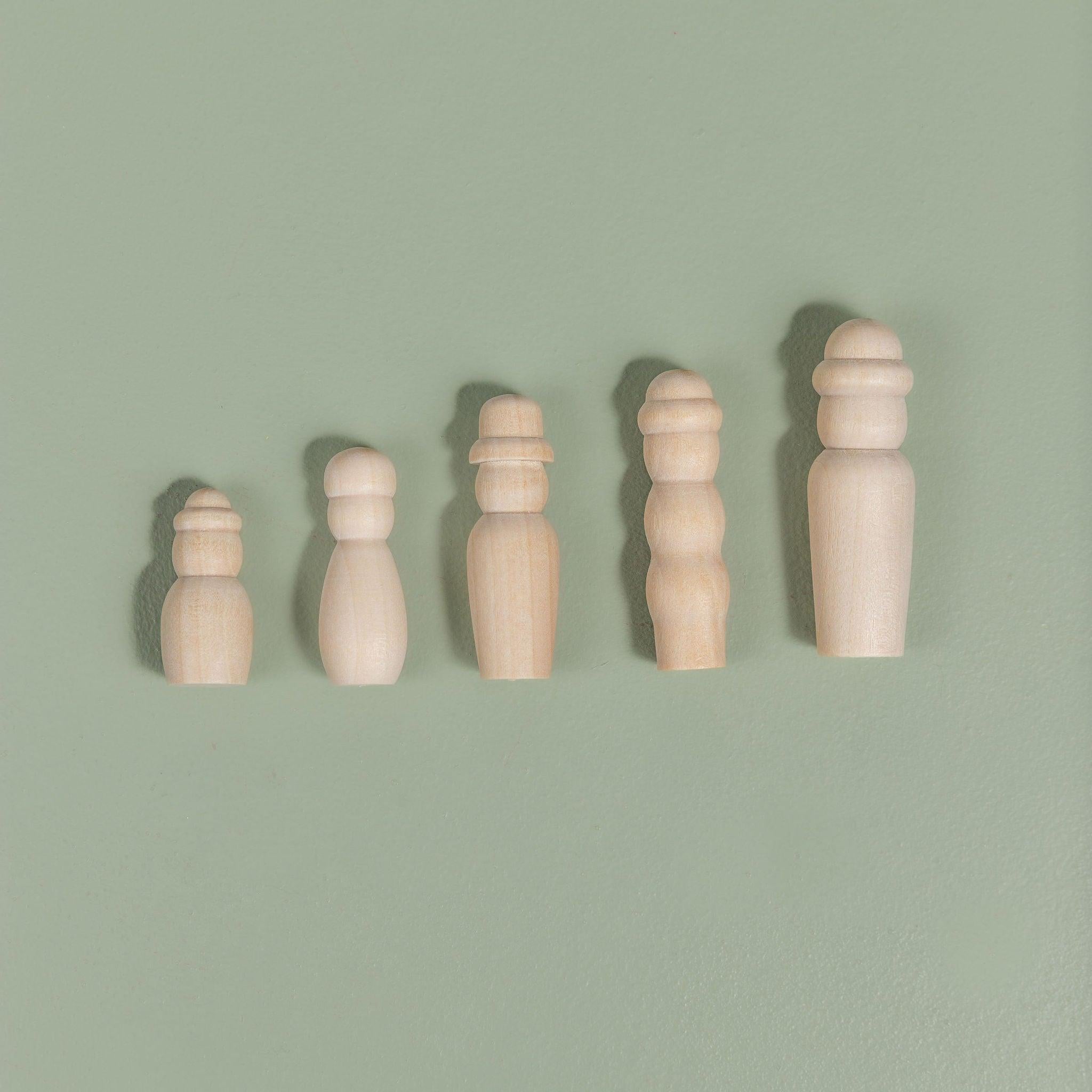 Variety of wooden peg doll characters for storytelling