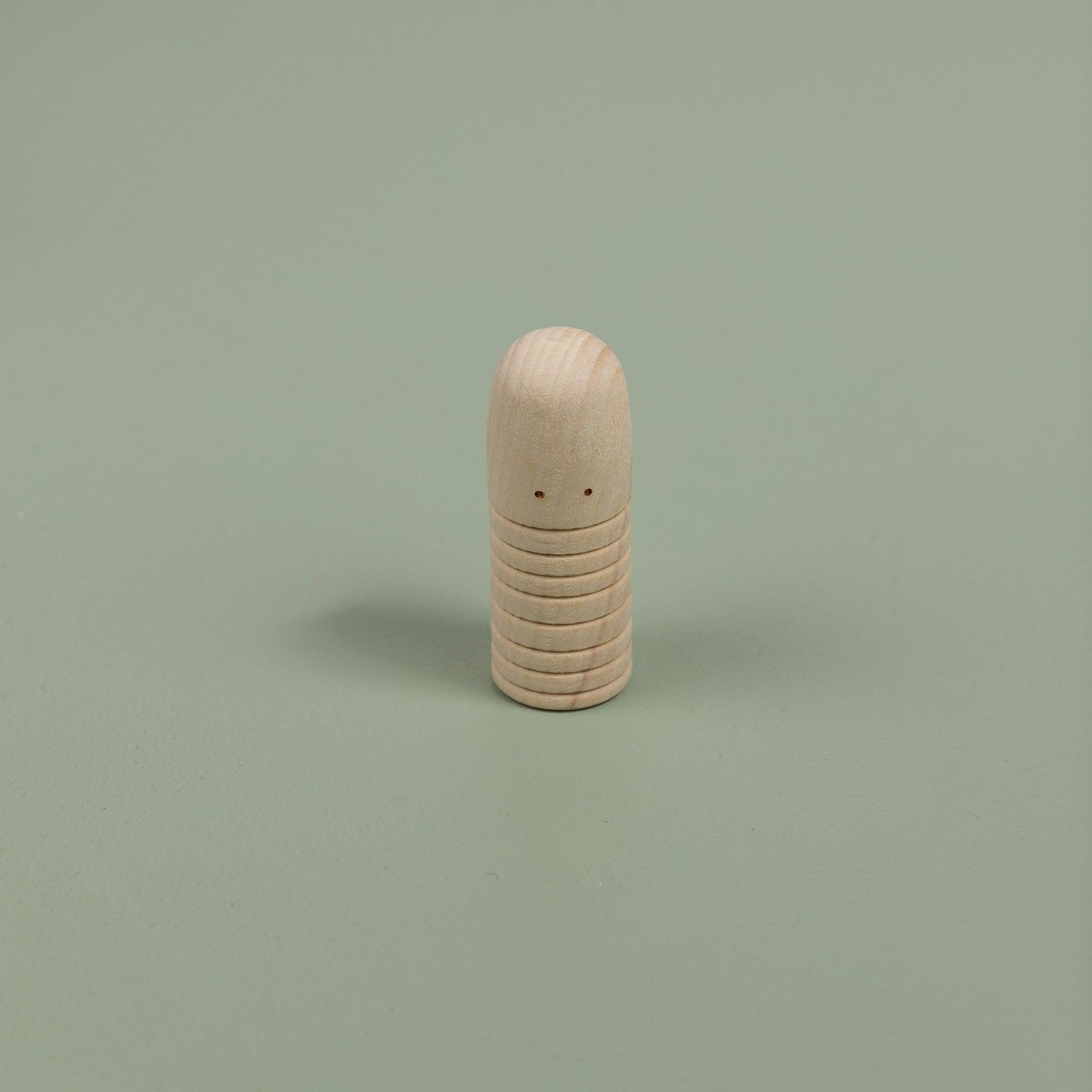 Peg dolls in various designs for creative storytelling