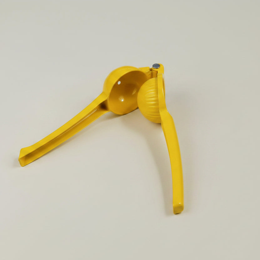 Yellow metal play dough squeeze tool, 19cm, standing upright against a plain background.