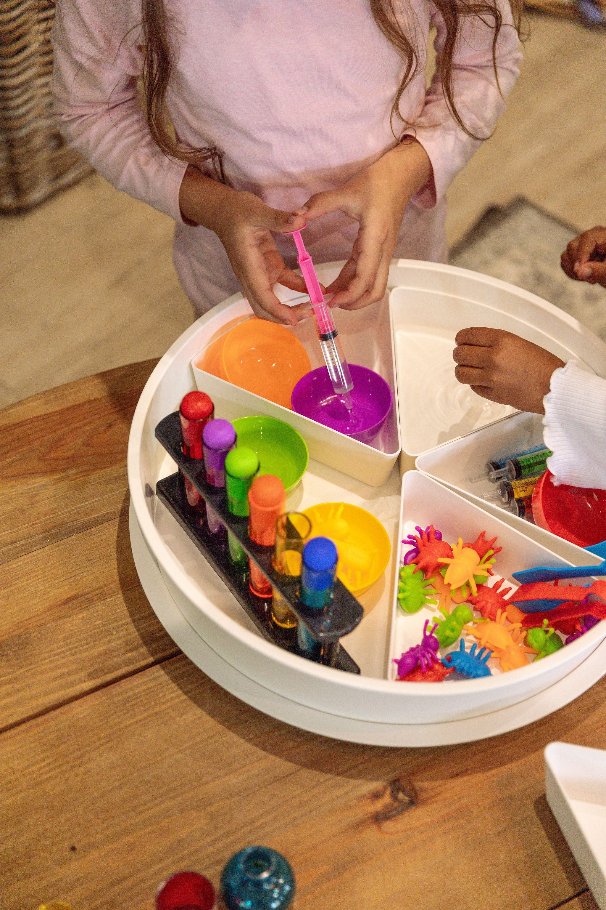 Children using STEM toys to build problem-solving and critical thinking skills through play