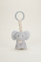 Plush elephant toy with a ring on a white background