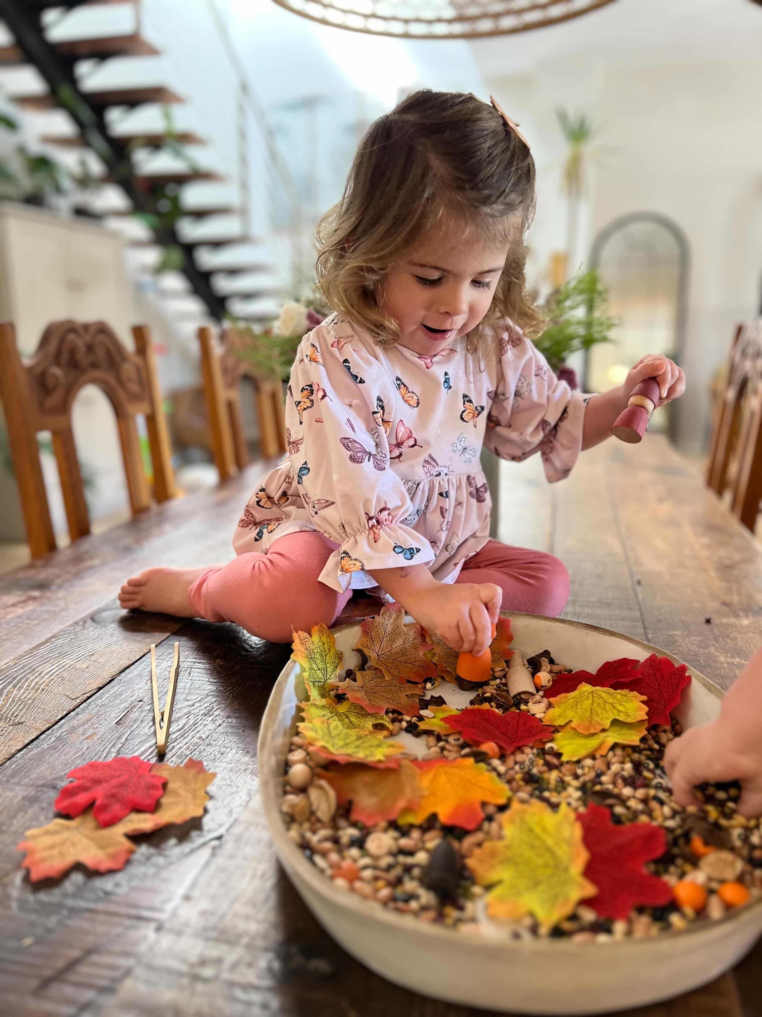 Pour and Play Sensory Set — OT-designed themed sensory play for children 3 years and older. Child Playing with Autumn set.
