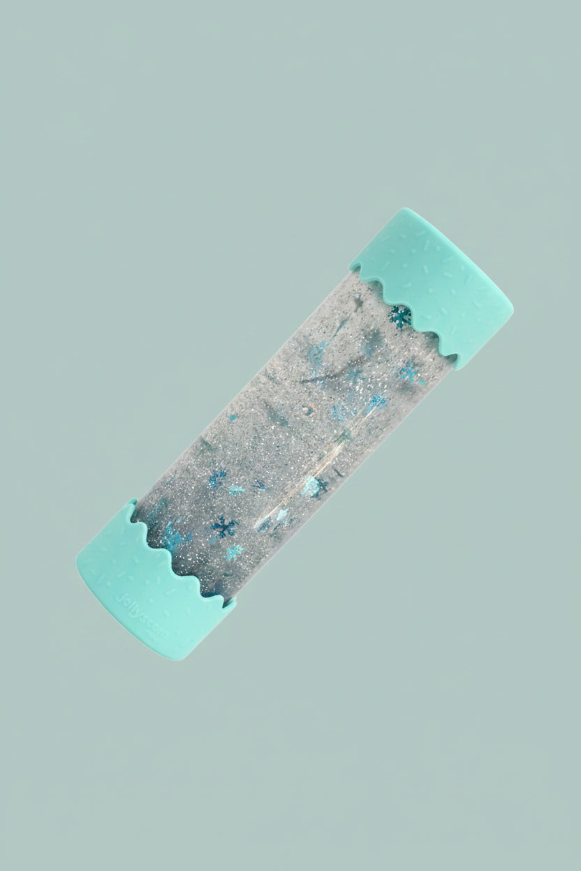 Baby Calming play bottles with turquoise edges on a blue  background