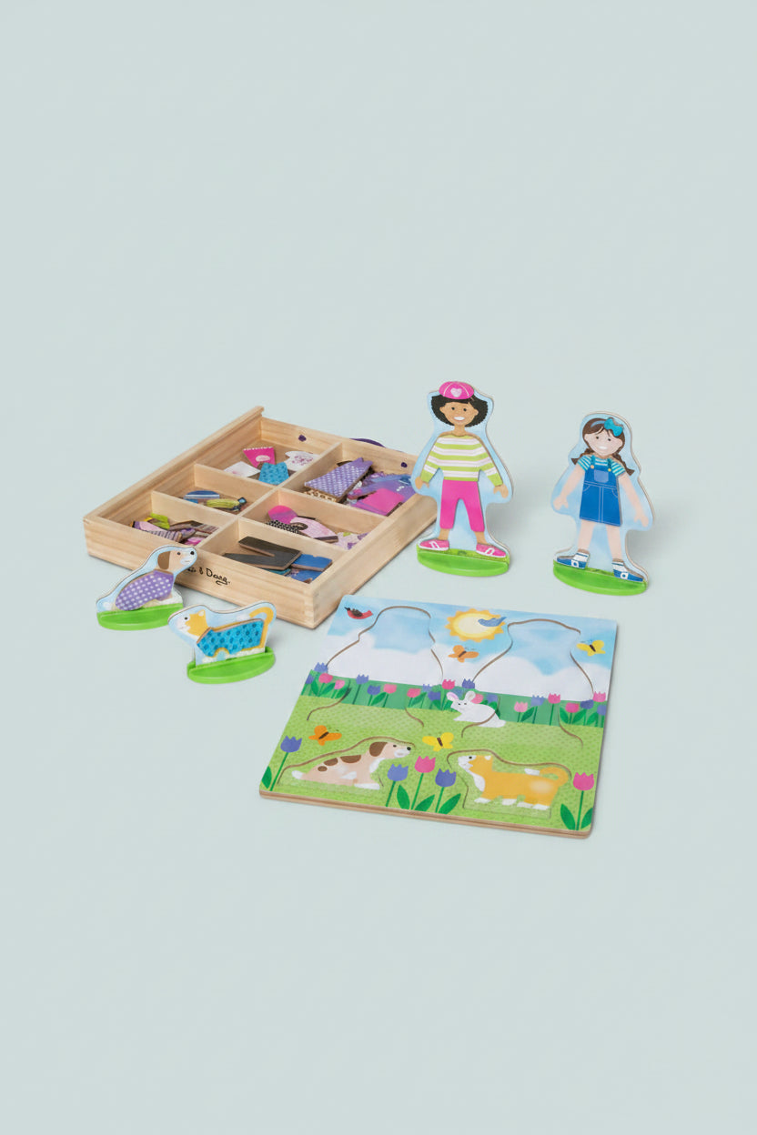 Wooden toy set with figures, a puzzle, and a box on a white background