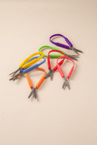 Self opening scissors with spring back action