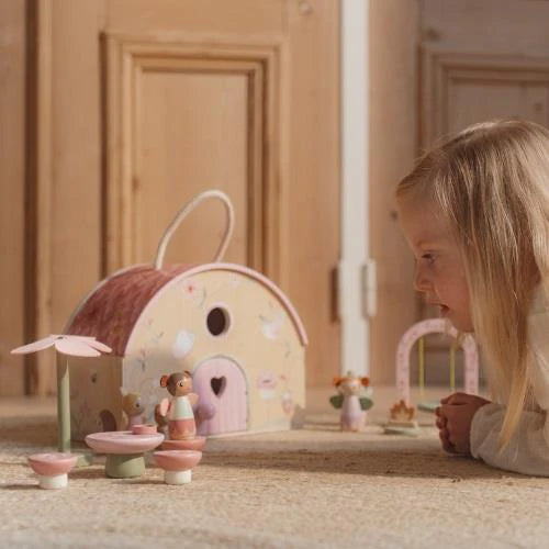 Fairy garden dollhouse with flowers and furniture