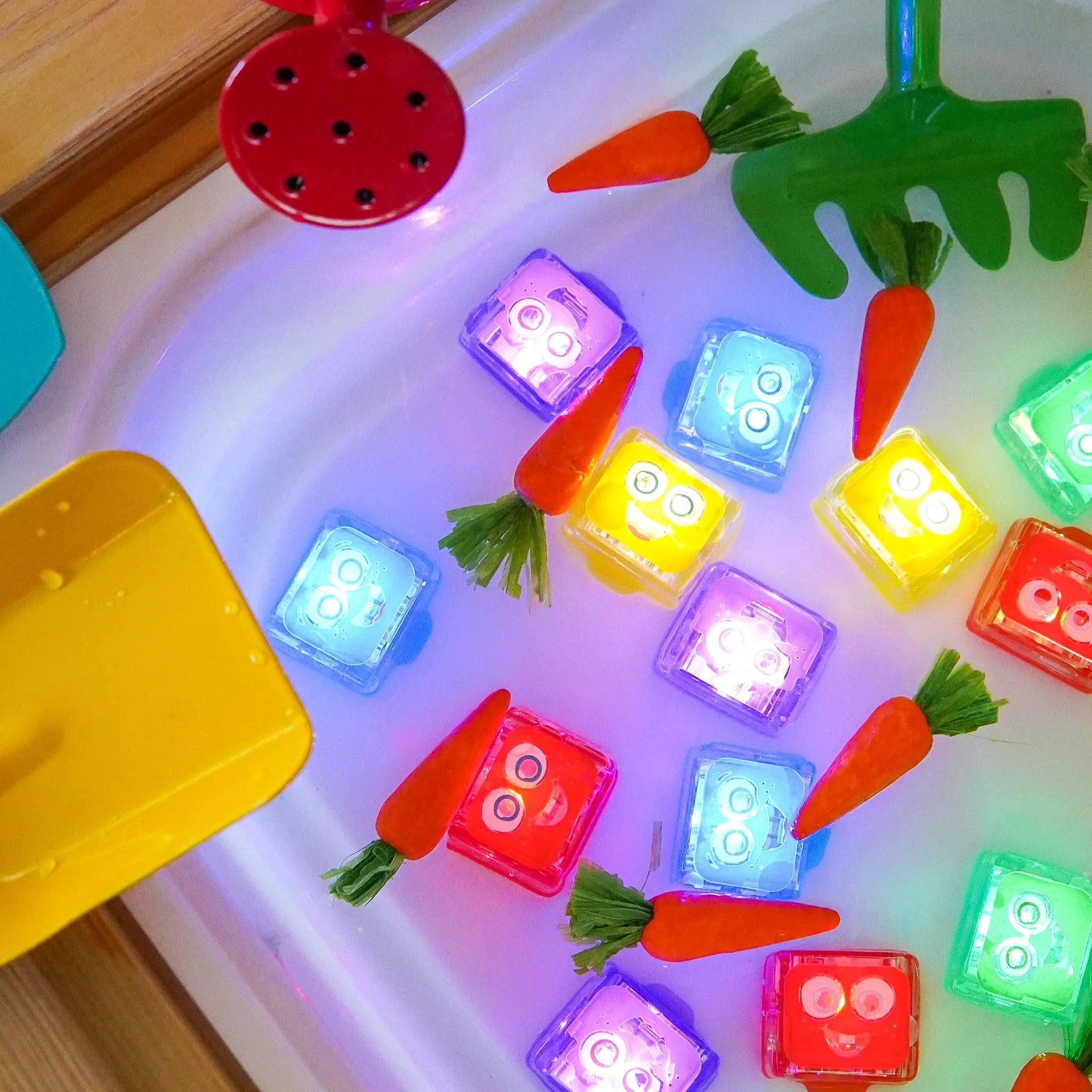 Light-up sensory cubes for bath play