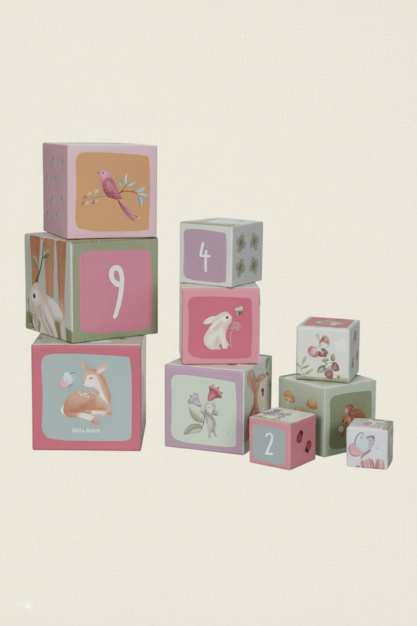 Set of children's building blocks with animal and number designs on a white background