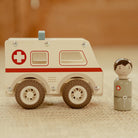 Little Dutch wooden ambulance toy with nurse figure