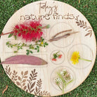 Kids using nature hunt board during outdoor play