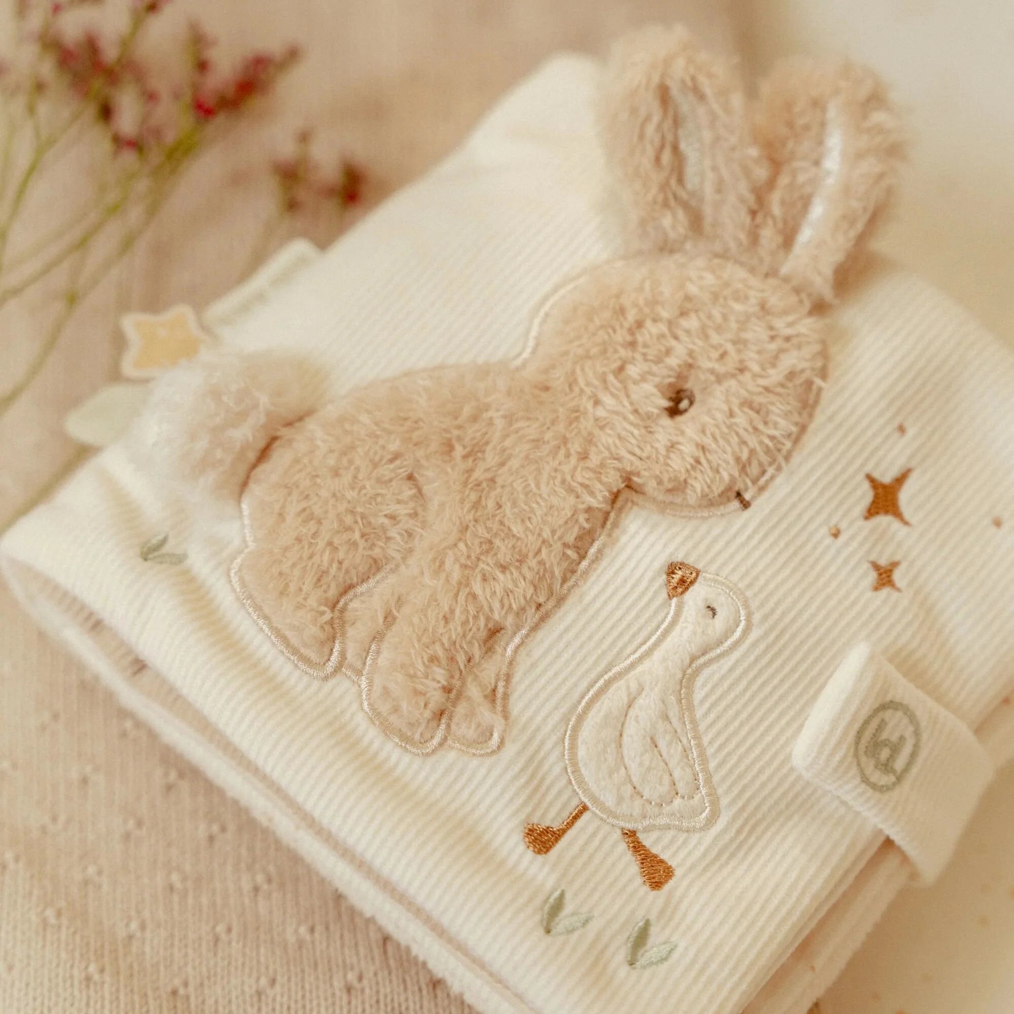 Soft fabric activity book with crinkle pages and mirror
