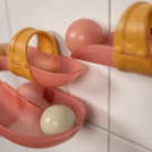 Pink bath ball track for toddlers