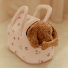 Plush dog toy with floral carry bag