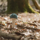 Fabric mushroom rattle with easy grip shape