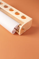 drawing with paper roll dispenser on table