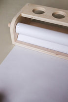 Table top paper dispenser with paper