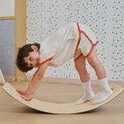Wooden wobble board for sensory and motor development
