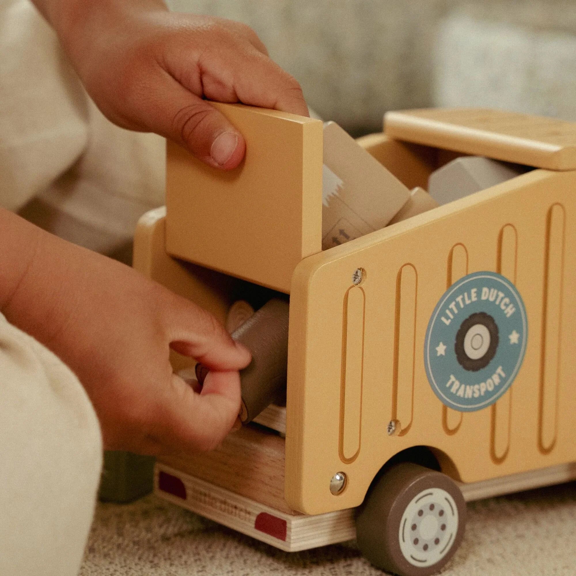 Wooden dump truck toy with tipping bed