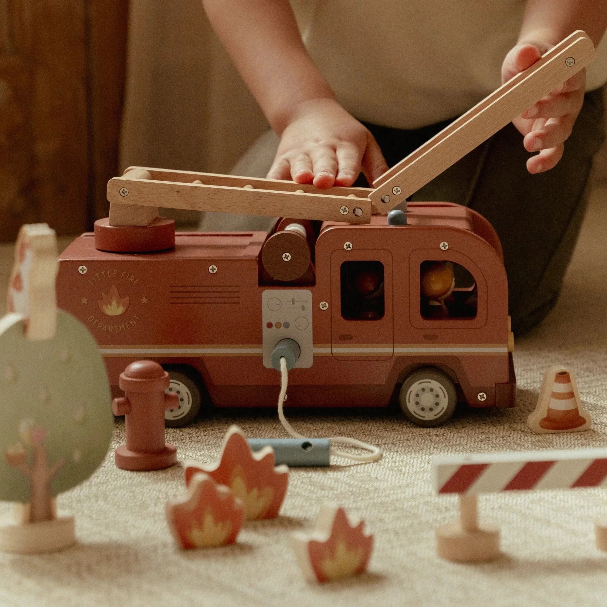 Wooden fire engine toy with ladder and hose for kids