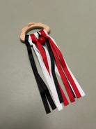 Sensory ribbon rattle for fine motor development
