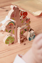 Forest Animal Threading Set with painted wooden woodland animals stacked on a wooden tree, on a plain white background – Tiny Tree Toys South Africa