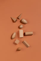 Montessori-inspired wooden geometric solids set