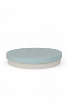 round sensory tray in light blue with a divider lid 