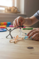 magnetic men child playing on table 