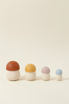 nesting silicone mushrooms on a stone background 