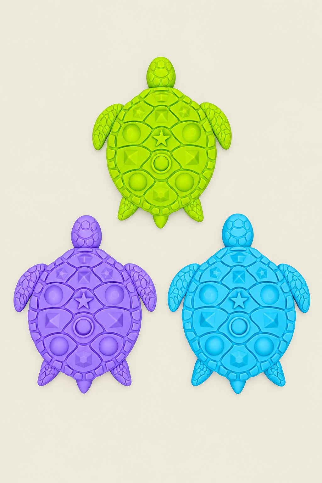 Three colorful turtle-shaped stepping stones textured  in purple, blue, and lime green arranged on a light wood surface.
